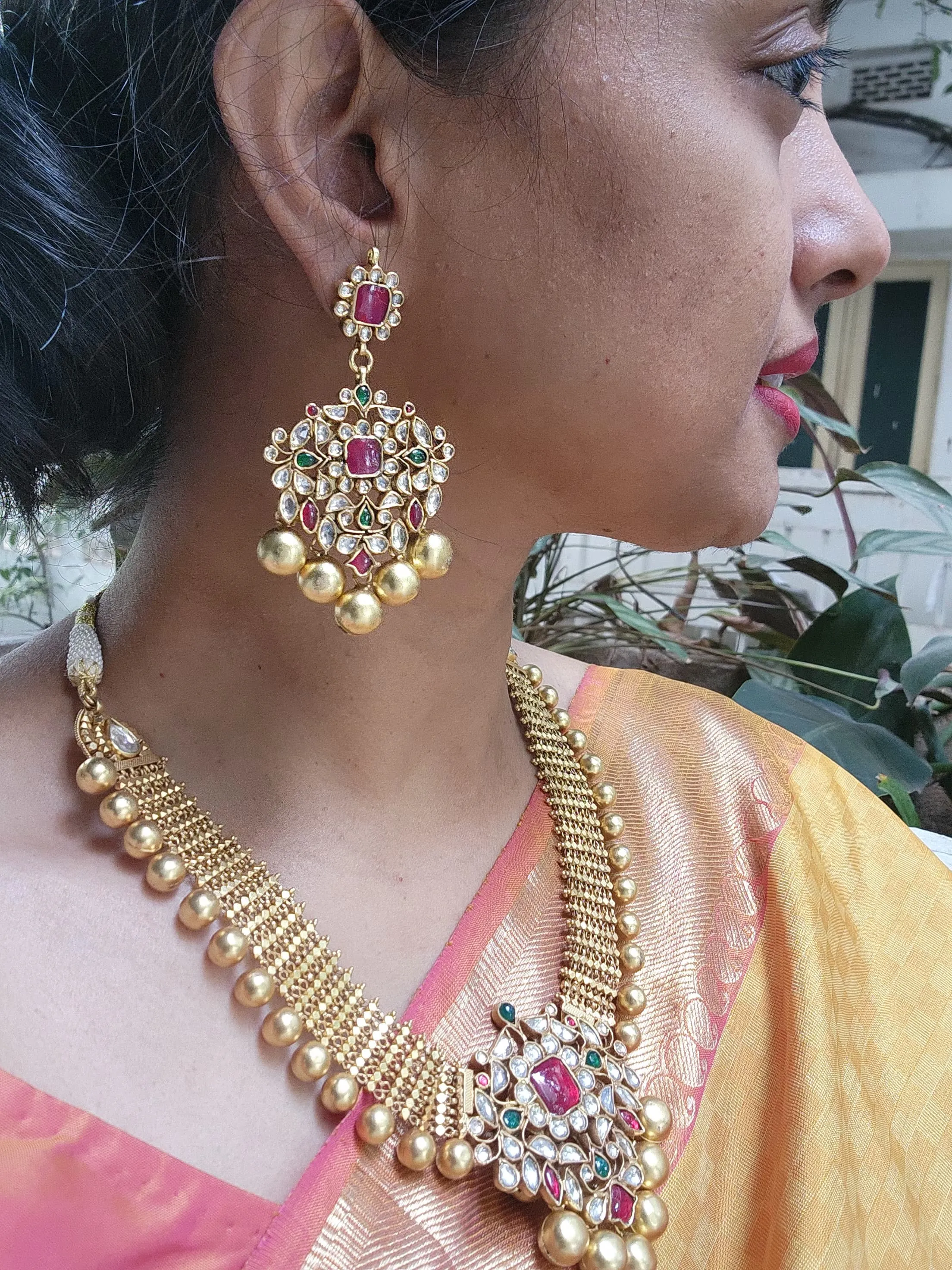 Antique gold polish set with kundan, ruby & emerald pendant with gold beads