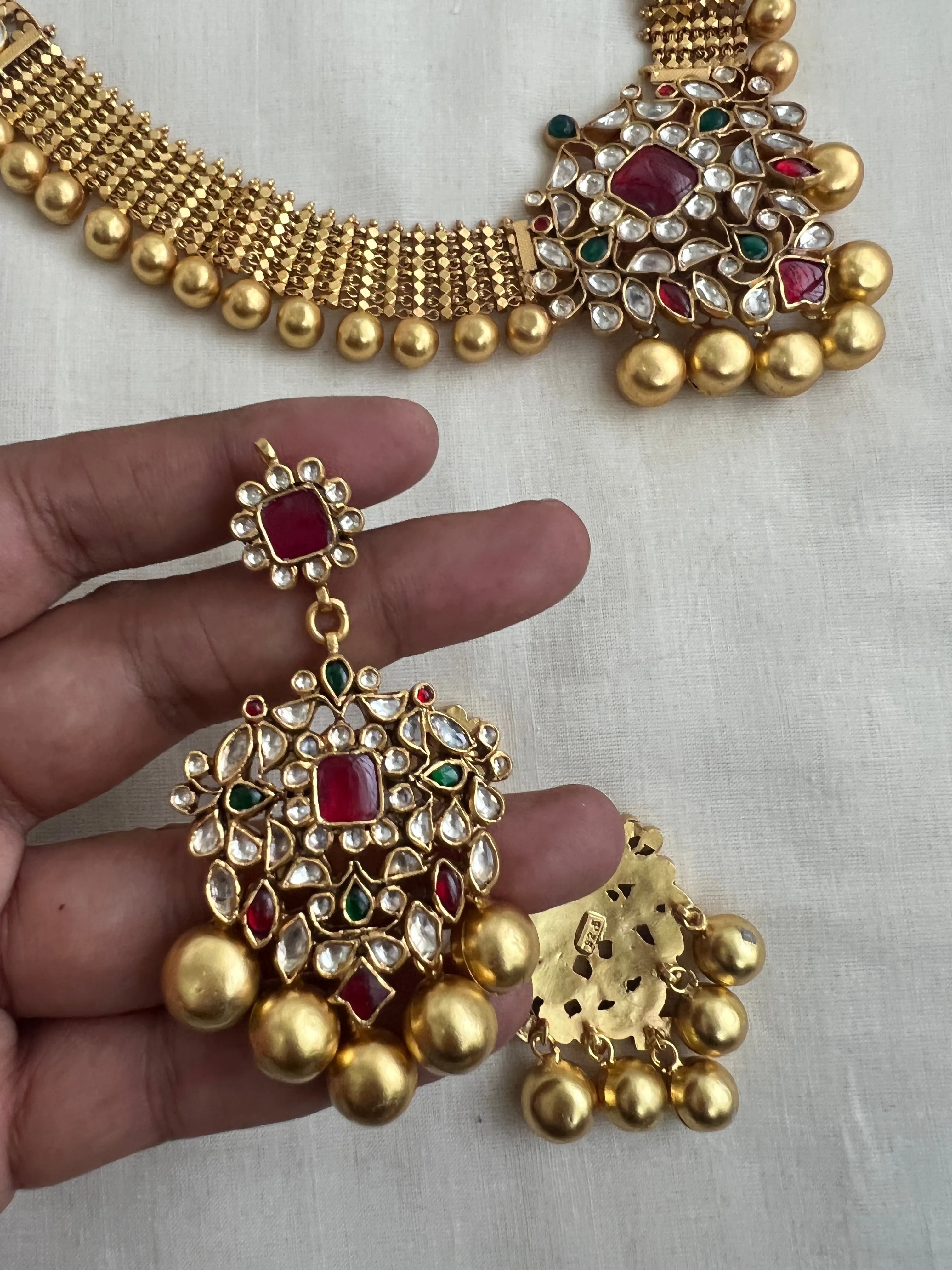 Antique gold polish set with kundan, ruby & emerald pendant with gold beads