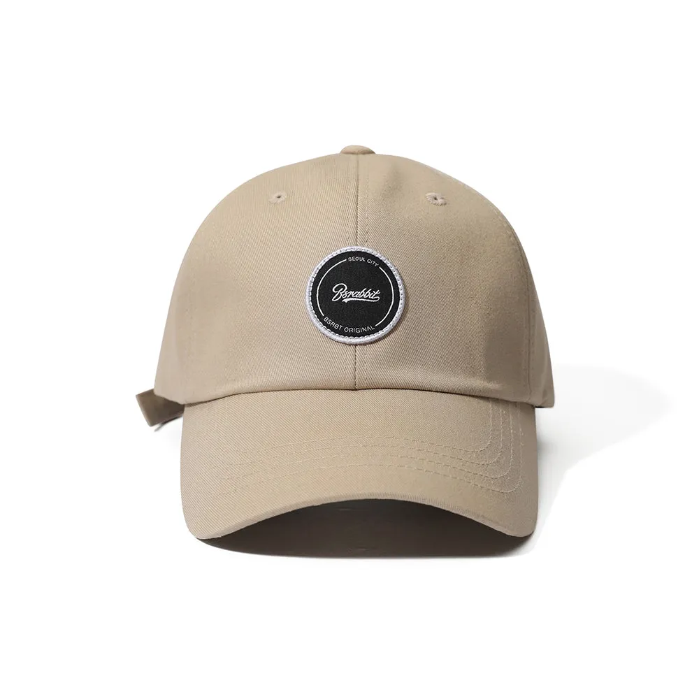 CIRCLE WAPPEN CAP BEIGE