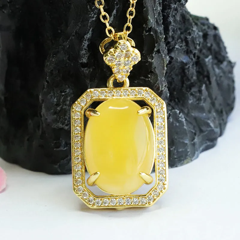 Honey Amber Zircon Oval Pendant in Sterling Silver