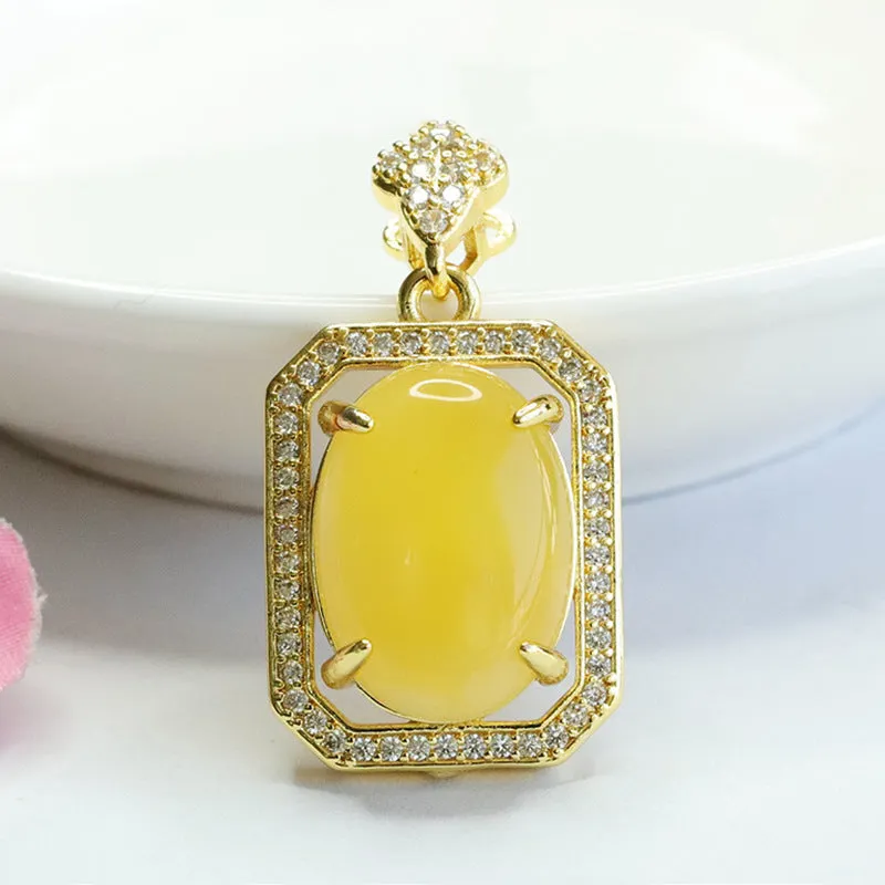 Honey Amber Zircon Oval Pendant in Sterling Silver