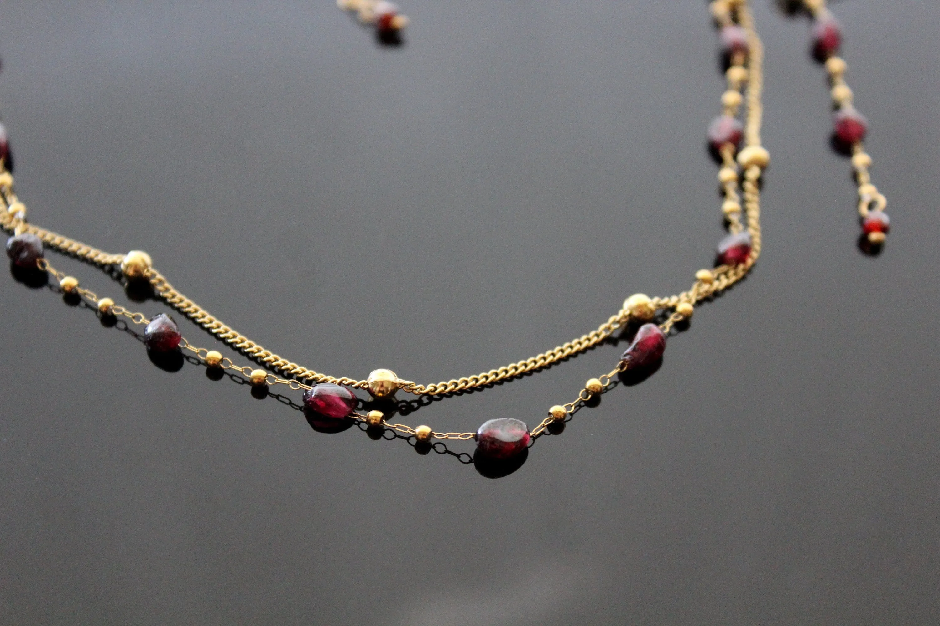 Natural garnet jewelry set with 18 K gold plated stainless steel parts