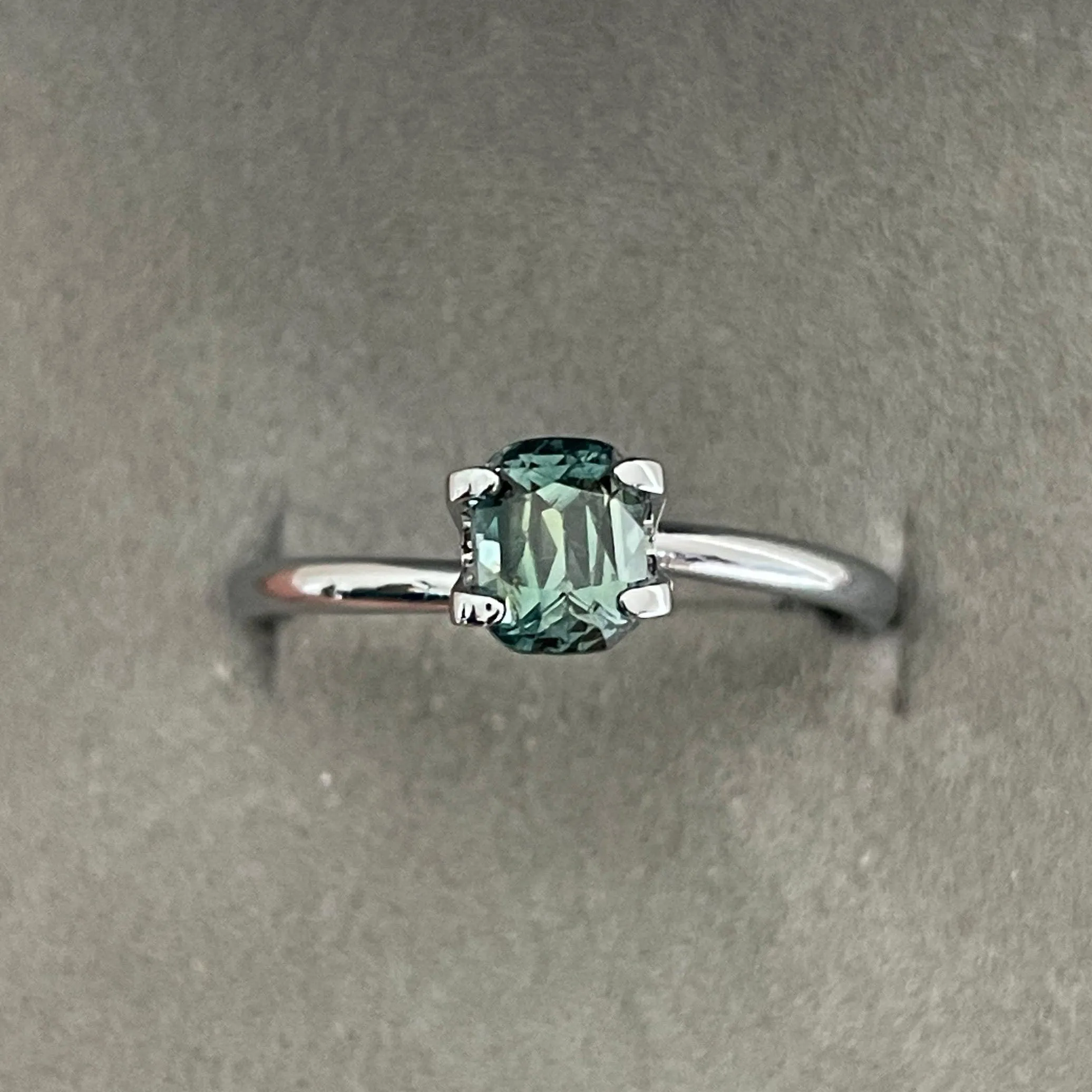 This 1.00 crt Green Sapphire is well cut to bring out the best colour and lustre, and has a perfect colour blend.