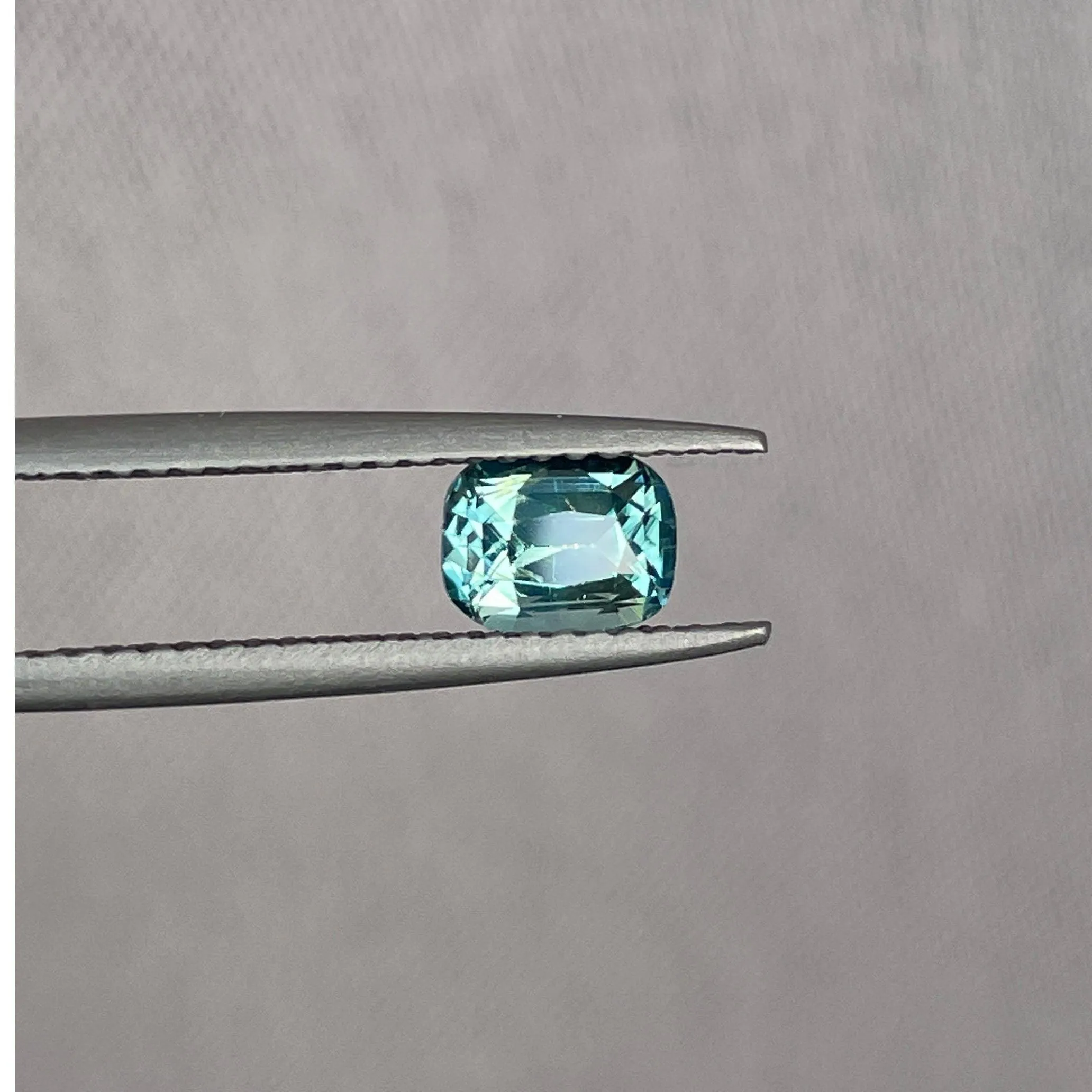 This 1.00 crt Green Sapphire is well cut to bring out the best colour and lustre, and has a perfect colour blend.