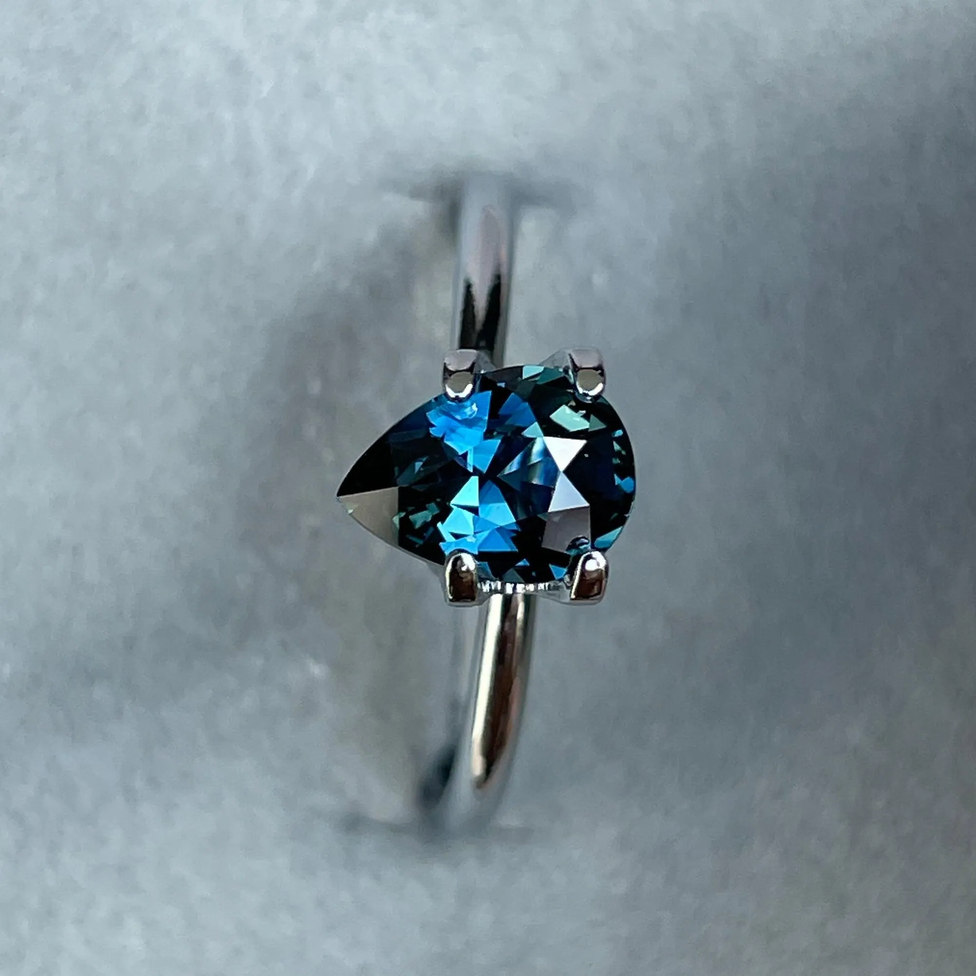 This 1.29 crt Teal Sapphire is well cut to bring out the best colour and lustre, and has a perfect colour blend.